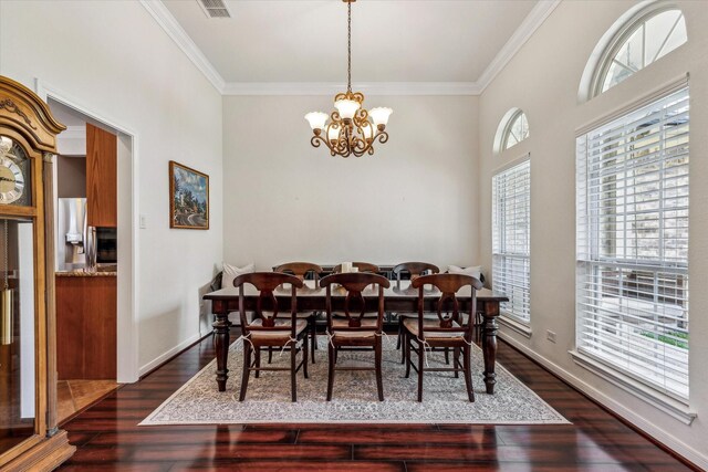 104 Lost Oaks Dr, Waco, TX 76705 - dining space featuring dark wood finished floors, a chandelier, and ornamental molding