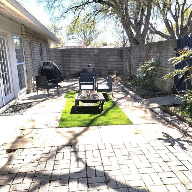 15642 Overmead Cir, Dallas, TX 75248 - view of patio featuring a fenced backyard