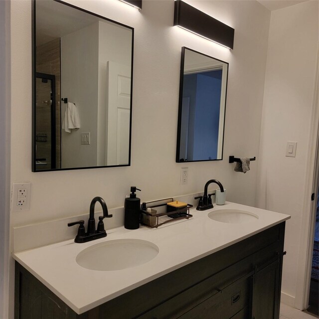 15642 Overmead Cir, Dallas, TX 75248 - bathroom with double vanity and a shower stall
