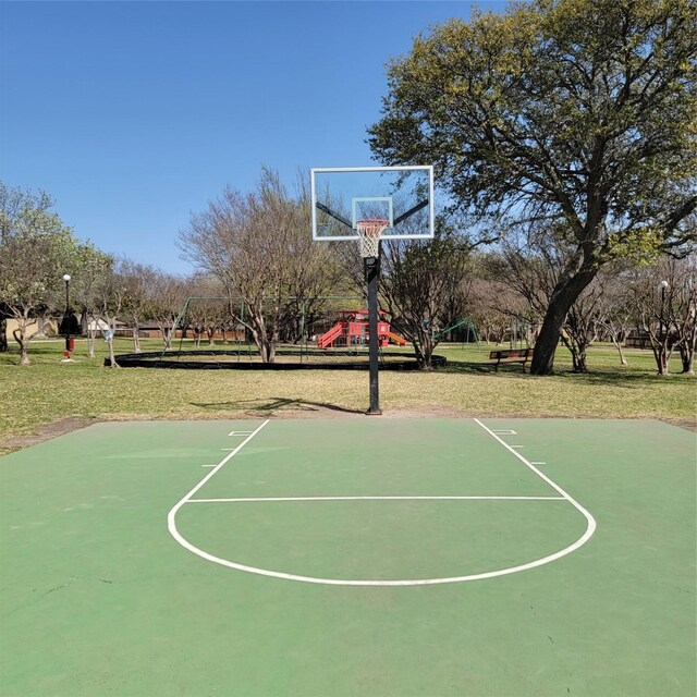 15642 Overmead Cir, Dallas, TX 75248 - view of basketball court with community basketball court and a lawn