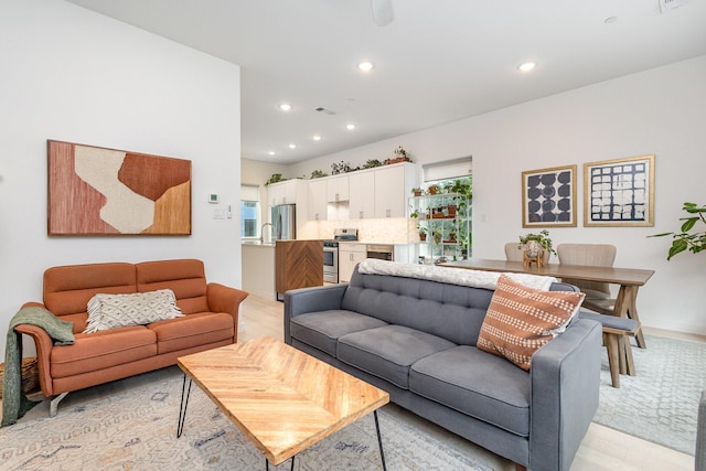 427 W 10th St Unit 803, Dallas, TX 75208 - living area featuring recessed lighting and light wood-type flooring