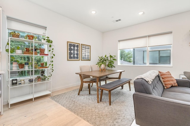 427 W 10th St Unit 803, Dallas, TX 75208 - dining area with light wood-type flooring, plenty of natural light, recessed lighting, and baseboards