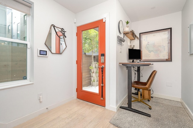 427 W 10th St Unit 803, Dallas, TX 75208 - entrance foyer featuring wood finished floors and baseboards