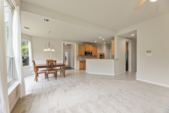 1928 Victoria Cir, Mckinney, TX 75072 - living room with light tile patterned floors, recessed lighting, baseboards, light carpet, and ceiling fan