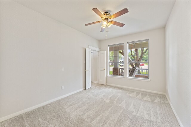 1928 Victoria Cir, Mckinney, TX 75072 - spare room with light colored carpet, baseboards, and a ceiling fan