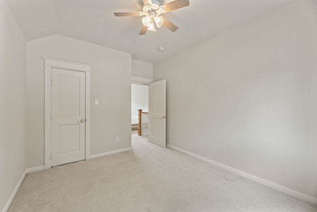 1928 Victoria Cir, Mckinney, TX 75072 - unfurnished bedroom featuring light colored carpet, lofted ceiling, baseboards, and ceiling fan