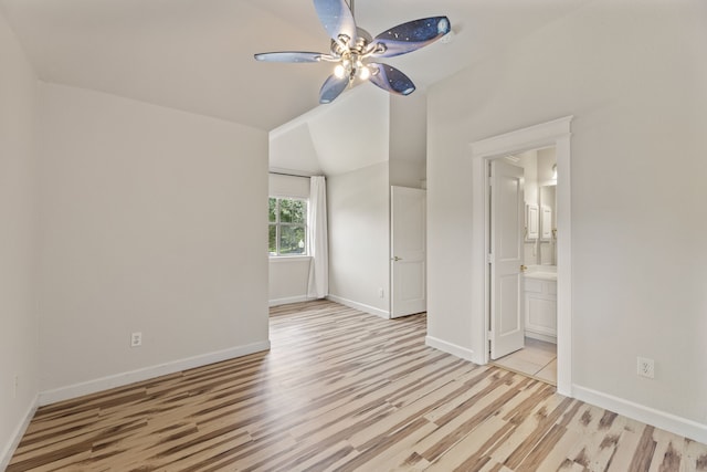 1928 Victoria Cir, Mckinney, TX 75072 - empty room with ceiling fan, light wood-type flooring, baseboards, and vaulted ceiling