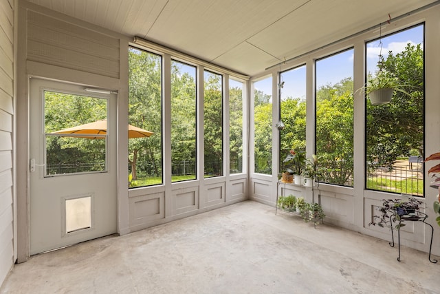 1928 Victoria Cir, Mckinney, TX 75072 - unfurnished sunroom featuring unfinished concrete floors