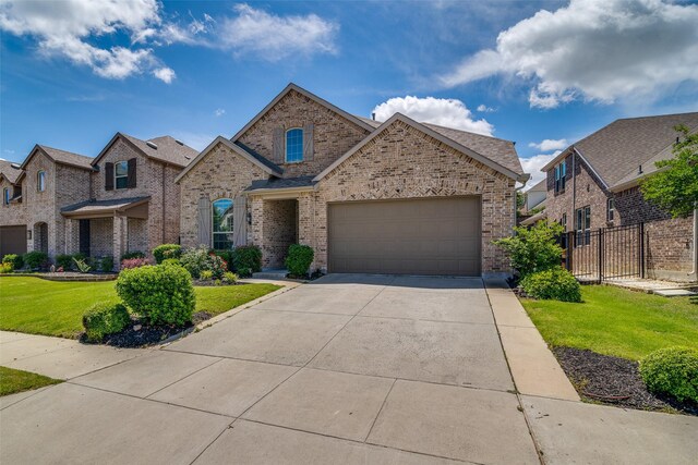 1822 Indigo Creek Ln, Wylie, TX 75098 - view of front of house featuring brick siding, driveway, and an attached garage