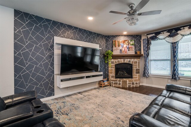 1822 Indigo Creek Ln, Wylie, TX 75098 - living area with an accent wall, a ceiling fan, baseboards, a fireplace, and recessed lighting