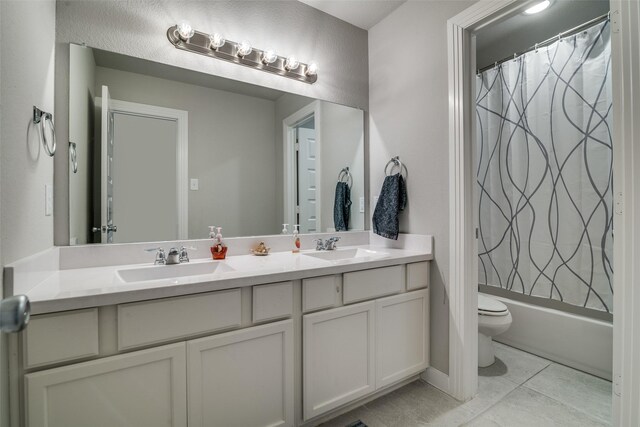 1822 Indigo Creek Ln, Wylie, TX 75098 - full bathroom featuring toilet, double vanity, tile patterned floors, and shower / tub combo