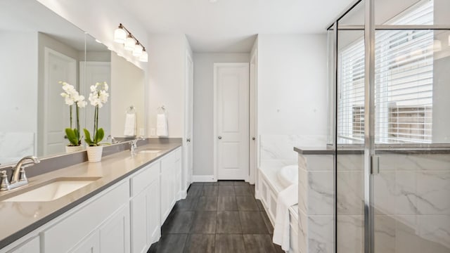 4190 Sandhills Ln, Prosper, TX 75078 - bathroom with healthy amount of natural light, a garden tub, a stall shower, and double vanity