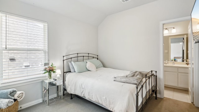 4190 Sandhills Ln, Prosper, TX 75078 - carpeted bedroom featuring ensuite bath, baseboards, and a sink