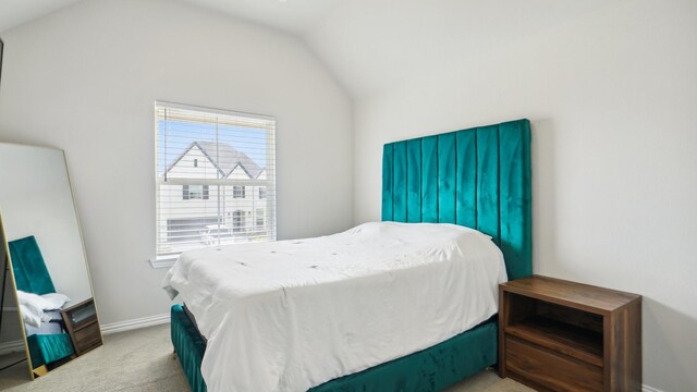 4190 Sandhills Ln, Prosper, TX 75078 - bedroom with light colored carpet, lofted ceiling, and baseboards