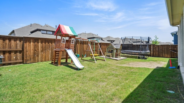 4190 Sandhills Ln, Prosper, TX 75078 - view of yard with a trampoline and a playground