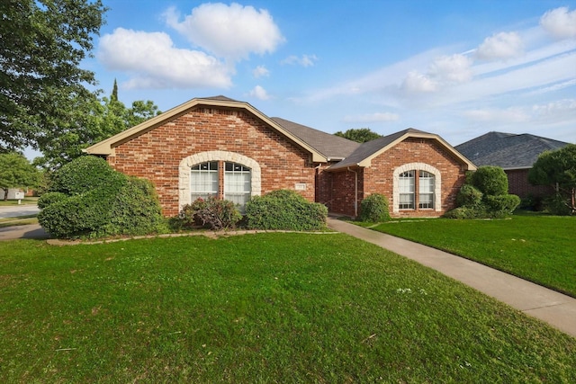 301 Angela Dr, Burleson, TX 76028 - ranch-style home with brick siding and a front lawn