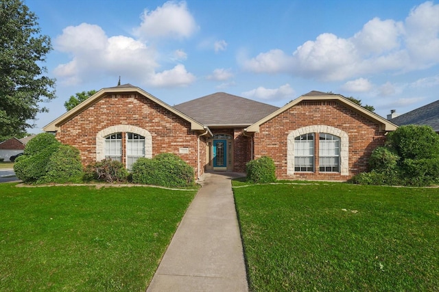 301 Angela Dr, Burleson, TX 76028 - view of front of home featuring brick siding, a front lawn, and a shingled roof