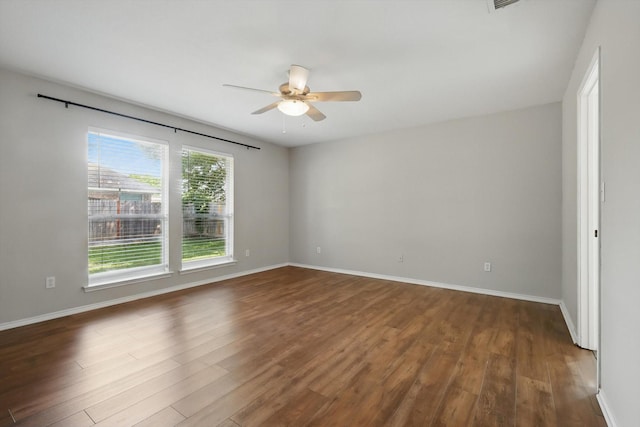 301 Angela Dr, Burleson, TX 76028 - spare room with a ceiling fan, wood finished floors, and baseboards