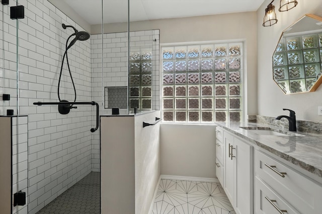 301 Angela Dr, Burleson, TX 76028 - full bath with a tile shower, healthy amount of natural light, vanity, and tile patterned flooring