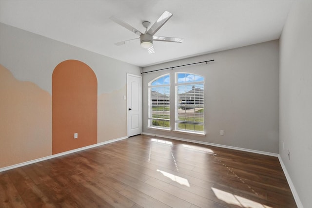 301 Angela Dr, Burleson, TX 76028 - spare room featuring ceiling fan, wood finished floors, and baseboards