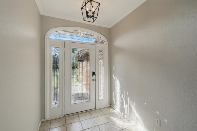 301 Angela Dr, Burleson, TX 76028 - entrance foyer featuring a chandelier, light tile patterned floors, baseboards, and crown molding