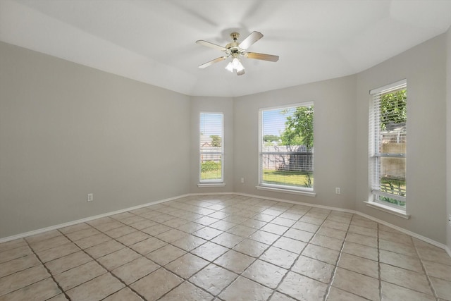 301 Angela Dr, Burleson, TX 76028 - spare room featuring a ceiling fan, baseboards, and light tile patterned floors