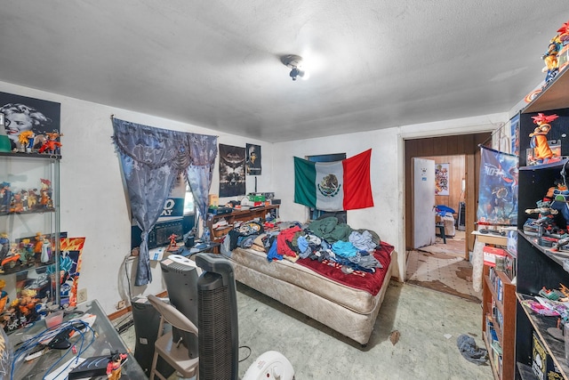 14581 Texas Highway 11 E, Pickton, TX 75471 - bedroom featuring a textured ceiling