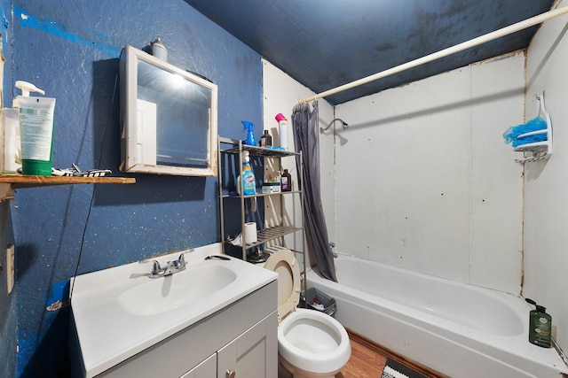 14581 Texas Highway 11 E, Pickton, TX 75471 - full bathroom featuring shower / bath combination with curtain, vanity, wood finished floors, and toilet