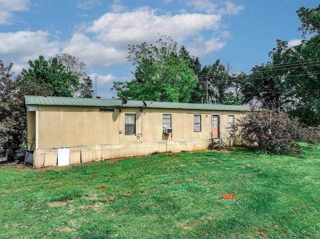 14581 Texas Highway 11 E, Pickton, TX 75471 - manufactured / mobile home featuring a front yard, cooling unit, and metal roof