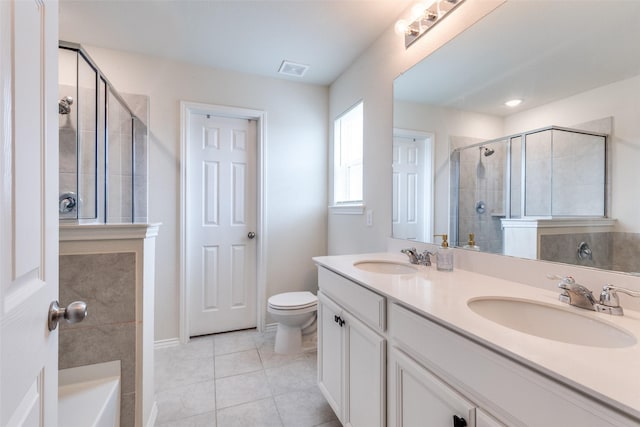 5616 Apple Grove Way, Fort Worth, TX 76123 - bathroom with a stall shower, tile patterned flooring, toilet, double vanity, and baseboards