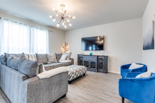 5616 Apple Grove Way, Fort Worth, TX 76123 - living area featuring a chandelier, light wood-style flooring, and baseboards