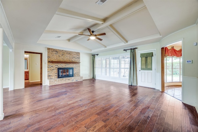 2500 Shoreline Dr, Sherman, TX 75092 - unfurnished living room with a ceiling fan, wood finished floors, and a brick fireplace