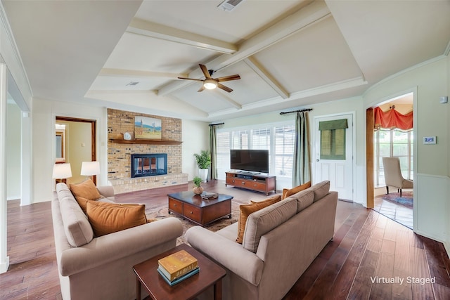 2500 Shoreline Dr, Sherman, TX 75092 - living room with dark wood-style flooring, ceiling fan, and a fireplace