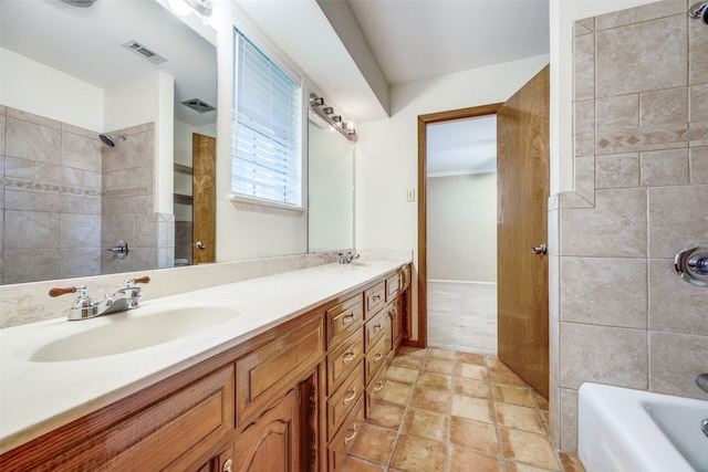 2500 Shoreline Dr, Sherman, TX 75092 - bathroom featuring double vanity and bathing tub / shower combination