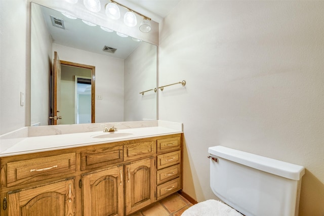 2500 Shoreline Dr, Sherman, TX 75092 - half bath with toilet, vanity, and tile patterned flooring