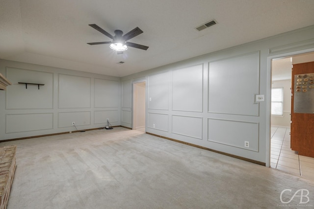 4417 Pamela Dr, Abilene, TX 79606 - carpeted empty room featuring a decorative wall and a ceiling fan