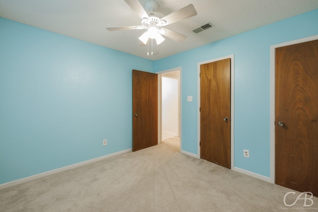 4417 Pamela Dr, Abilene, TX 79606 - unfurnished bedroom with carpet, baseboards, and a ceiling fan
