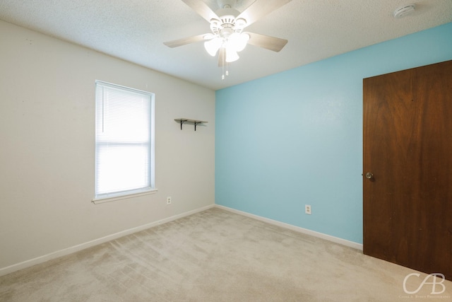4417 Pamela Dr, Abilene, TX 79606 - unfurnished room with carpet floors, ceiling fan, baseboards, a smoke detector, and a textured ceiling