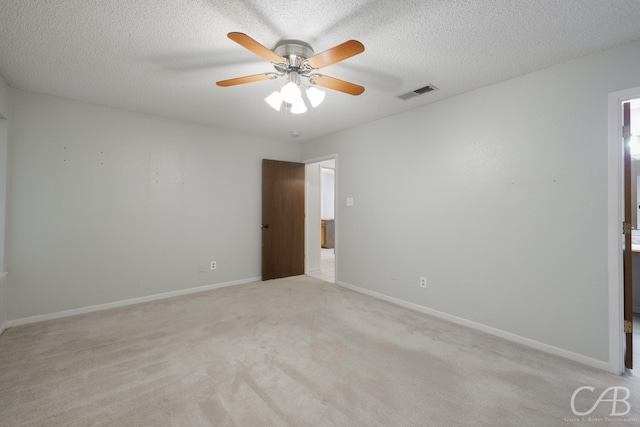 4417 Pamela Dr, Abilene, TX 79606 - unfurnished room with ceiling fan, a textured ceiling, light carpet, and baseboards