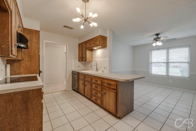 4417 Pamela Dr, Abilene, TX 79606 - kitchen featuring a textured ceiling, black appliances, ventilation hood, a sink, and light tile patterned flooring