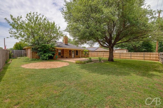 4417 Pamela Dr, Abilene, TX 79606 - view of yard with a patio area