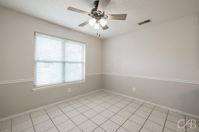 4417 Pamela Dr, Abilene, TX 79606 - empty room featuring a textured ceiling, ceiling fan, and baseboards