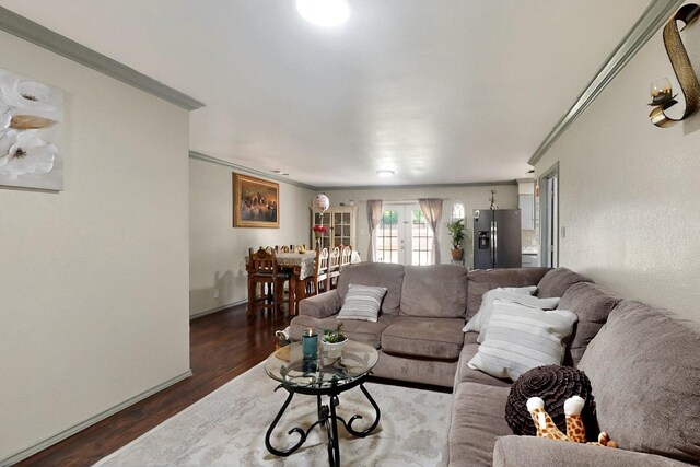 805 Loganwood Dr, Royse City, TX 75189 - living area featuring french doors, wood finished floors, ornamental molding, and baseboards