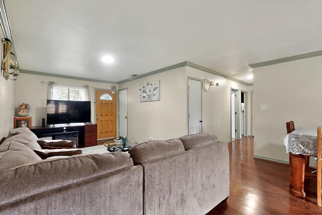 805 Loganwood Dr, Royse City, TX 75189 - living room with ornamental molding and dark wood-style flooring