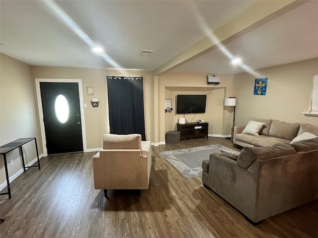 living area with dark wood finished floors and baseboards