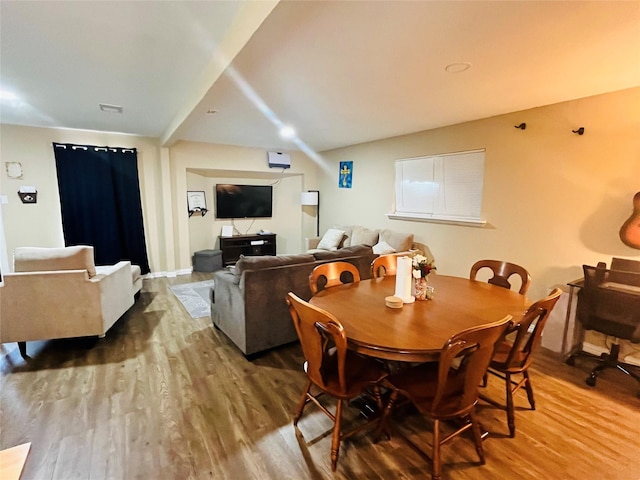 dining space featuring wood finished floors