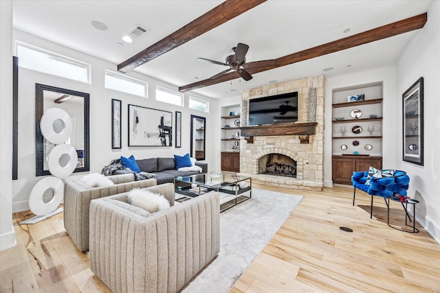 933 Glenhurst Rd, Keller, TX 76248 - living room with hardwood / wood-style floors, built in features, beam ceiling, baseboards, and a ceiling fan