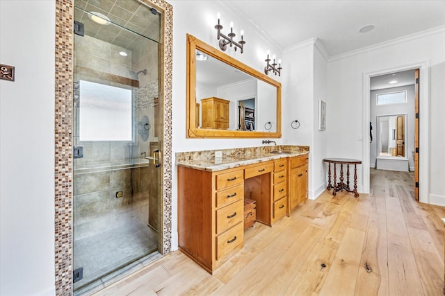 933 Glenhurst Rd, Keller, TX 76248 - bathroom featuring a shower stall, hardwood / wood-style floors, ornamental molding, vanity, and healthy amount of natural light