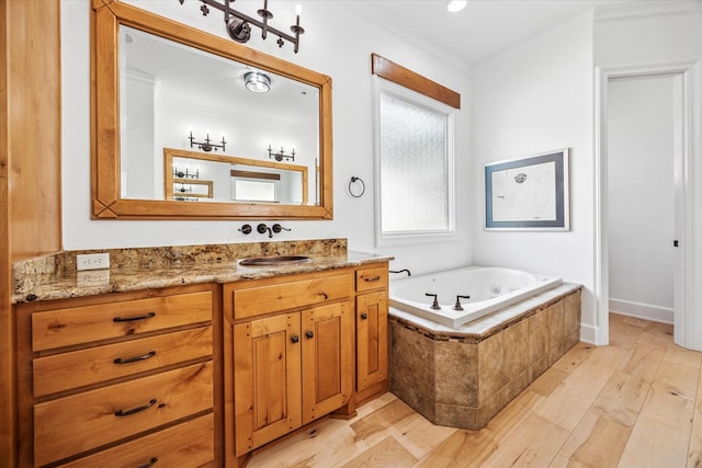 933 Glenhurst Rd, Keller, TX 76248 - full bath with crown molding, a tub with jets, vanity, and wood finished floors