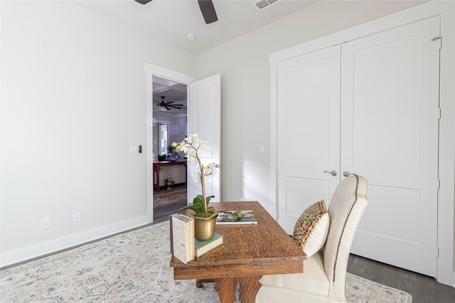 3928 Hogan Dr, Tyler, TX 75709 - home office featuring a ceiling fan, wood finished floors, and baseboards